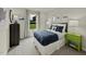 Bright bedroom featuring carpet, a comfortable bed, and views of the outdoors through a large window at 708 Deschutes Dr, Garner, NC 27529