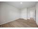 Comfortable bedroom with hardwood floors and closet at 708 Deschutes Dr, Garner, NC 27529