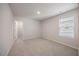 Bedroom with neutral carpet, a window, and modern paint at 708 Deschutes Dr, Garner, NC 27529