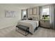Relaxing bedroom with a queen-sized bed, soft carpet, modern decor, and natural light at 708 Deschutes Dr, Garner, NC 27529