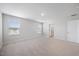 Main bedroom suite featuring carpet, natural light, and an ensuite bathroom at 708 Deschutes Dr, Garner, NC 27529