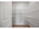 Walk-in pantry featuring multiple shelves and ample storage space perfect for organizing food and household supplies at 708 Deschutes Dr, Garner, NC 27529