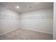 Walk-in closet with carpet and wired shelving providing ample storage space at 708 Deschutes Dr, Garner, NC 27529