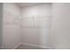 Walk-in closet featuring carpeted flooring and wire shelving for storage at 708 Deschutes Dr, Garner, NC 27529