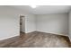 Comfortable bedroom with stylish flooring and neutral walls at 7289 Nc 561, Louisburg, NC 27549
