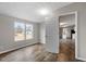 Bedroom with hardwood floors with views to the kitchen at 7289 Nc 561, Louisburg, NC 27549