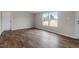 Bright bedroom with hardwood floors and double windows at 7289 Nc 561, Louisburg, NC 27549