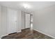 Bedroom with hardwood floors and double closet at 7289 Nc 561, Louisburg, NC 27549