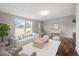 Bright living room with a comfortable white sofa and neutral accents at 7289 Nc 561, Louisburg, NC 27549