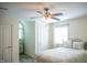 Bedroom showcasing neutral walls, a comfortable bed, and a window for natural light at 7371 Leasburg Rd, Roxboro, NC 27574