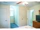 Bedroom featuring blue carpet at 7371 Leasburg Rd, Roxboro, NC 27574