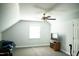 Bedroom featuring a ceiling fan, a window and a television on a TV stand at 7371 Leasburg Rd, Roxboro, NC 27574