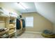 Spacious walk-in closet with shelving, clothing racks, and natural light from the window at 7371 Leasburg Rd, Roxboro, NC 27574