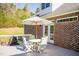View of the deck with outdoor furniture and a grill, ideal for outdoor dining at 7371 Leasburg Rd, Roxboro, NC 27574
