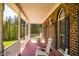 Cozy front porch with rocking chairs, offering a peaceful outdoor space at 7371 Leasburg Rd, Roxboro, NC 27574