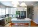 Bright kitchen with a spacious island and stainless steel appliances at 7371 Leasburg Rd, Roxboro, NC 27574