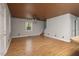 Spacious living room featuring hardwood floors, and wood ceiling at 952 Glover Rd, Dunn, NC 28334