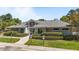 Well-maintained clubhouse featuring manicured landscaping, convenient parking, and accessible walkways at 5113 Windance Pl, Holly Springs, NC 27540