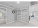 Hallway with built-in bookcase at 5113 Windance Pl, Holly Springs, NC 27540