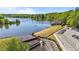 Scenic lake view showcasing the surrounding natural beauty and serene waters in this waterfront community at 5113 Windance Pl, Holly Springs, NC 27540
