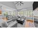 Comfortable living room view with a fireplace and lots of natural light at 5113 Windance Pl, Holly Springs, NC 27540