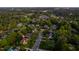 Aerial view of a community showcasing lush landscaping, well-maintained homes, and tree-lined streets at 10 Twinleaf Pl, Durham, NC 27705