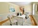 Bright and airy office space featuring a desk, seating, and view into entry way at 10 Twinleaf Pl, Durham, NC 27705