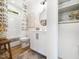 Clean bathroom features a shower, modern vanity, wood floors, and contemporary fixtures at 104 Blue Finch Ct, Youngsville, NC 27596