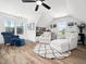 Cozy sitting area with natural light and neutral decor at 104 Blue Finch Ct, Youngsville, NC 27596