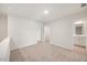 Cozy bedroom with carpeted floors, neutral paint, and a closet at 1048 Winding Spring Dr, Mebane, NC 27302