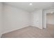 Bedroom featuring neutral carpet, fresh paint, and a closet at 1048 Winding Spring Dr, Mebane, NC 27302