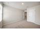 Bedroom featuring neutral carpeting, light walls, and a closet at 1048 Winding Spring Dr, Mebane, NC 27302