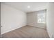 Bedroom with neutral carpeting, a bright window, and a closet at 1048 Winding Spring Dr, Mebane, NC 27302