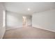 Spacious main bedroom with natural light, carpet and an ensuite bathroom at 1048 Winding Spring Dr, Mebane, NC 27302