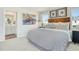 Serene main bedroom with neutral tones, plush bedding, and ample natural light at 1048 Winding Spring Dr, Mebane, NC 27302