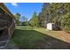 Spacious backyard with a small storage shed at 108 Ruff Davis Rd, Roxboro, NC 27574