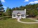 Charming one-story home with gray siding, metal roof and well maintained lawn at 108 Ruff Davis Rd, Roxboro, NC 27574