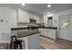 Modern kitchen with stainless steel appliances, granite countertops, and ample storage space, perfect for culinary enthusiasts at 108 Ruff Davis Rd, Roxboro, NC 27574