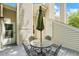Rear deck features an umbrella table surrounded by decorative walls at 108 Woodglen Dr, Cary, NC 27518