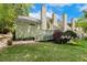 Backyard with patio, wooden deck, and manicured lawn at 108 Woodglen Dr, Cary, NC 27518