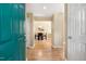 Open dining area with hardwood floors and a view into the kitchen at 108 Woodglen Dr, Cary, NC 27518
