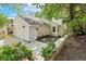 Charming home featuring a garage, manicured landscaping and neutral siding at 108 Woodglen Dr, Cary, NC 27518