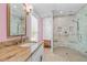 Bathroom featuring a granite countertop, white cabinets, and a walk-in shower with unique tile work at 109 N Hassel St, Hillsborough, NC 27278