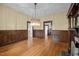 Spacious dining room with hardwood floors, decorative fireplace, and decorative lighting at 109 N Hassel St, Hillsborough, NC 27278