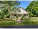 Inviting home with a classic design, a sprawling lawn, and mature trees at 109 N Hassel St, Hillsborough, NC 27278