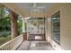 Inviting porch with a swing and a view of the neighborhood, perfect for relaxing outdoors at 109 N Hassel St, Hillsborough, NC 27278