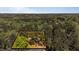 Aerial view showcases property within lush greenery and highlighted boundaries at 110 Omega Rd, Henderson, NC 27536