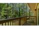 Relax on this beautiful balcony with wooded views at 110 Omega Rd, Henderson, NC 27536