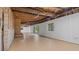 Spacious unfinished basement includes brick fireplace, exposed ceiling and framing at 110 Omega Rd, Henderson, NC 27536
