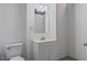 This bathroom features a new toilet and vanity with sink at 110 Omega Rd, Henderson, NC 27536